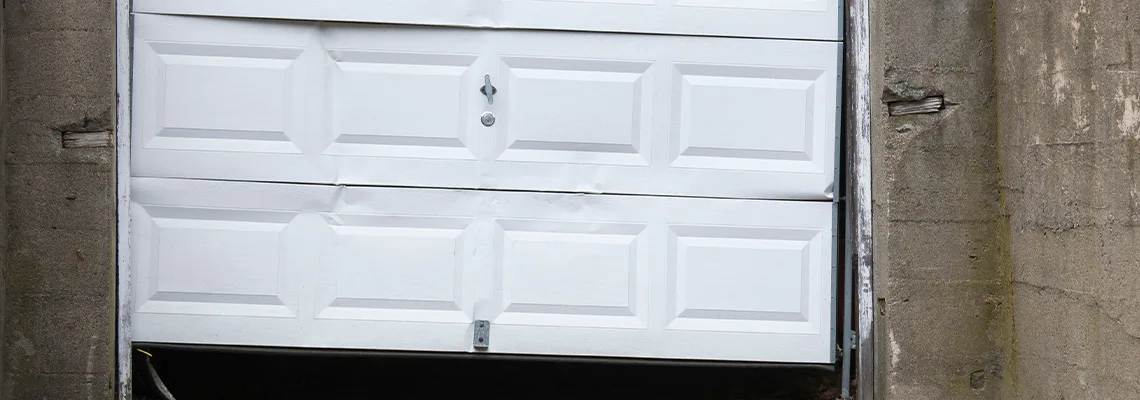 Garage Door Got Hit By A Car Dent Removal in Richmond, BC