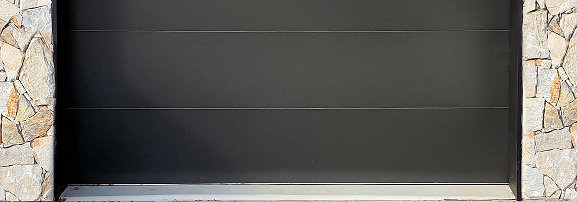 Overhead Black Garage Door Installation in Richmond, British Columbia